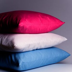 Close-Up Of Colorful Stacked Cushions